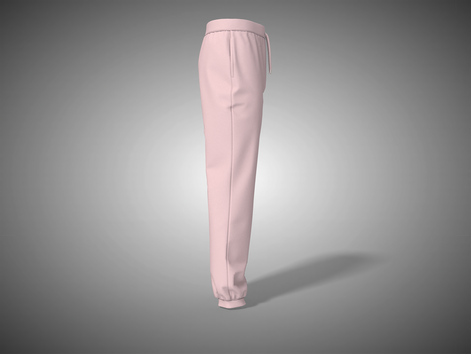 Baby pink pants on a gray background