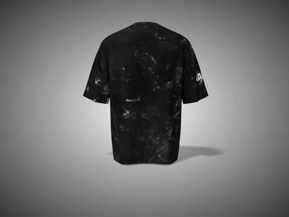 Black t-shirt with a small white logo on the sleeve against a gray background