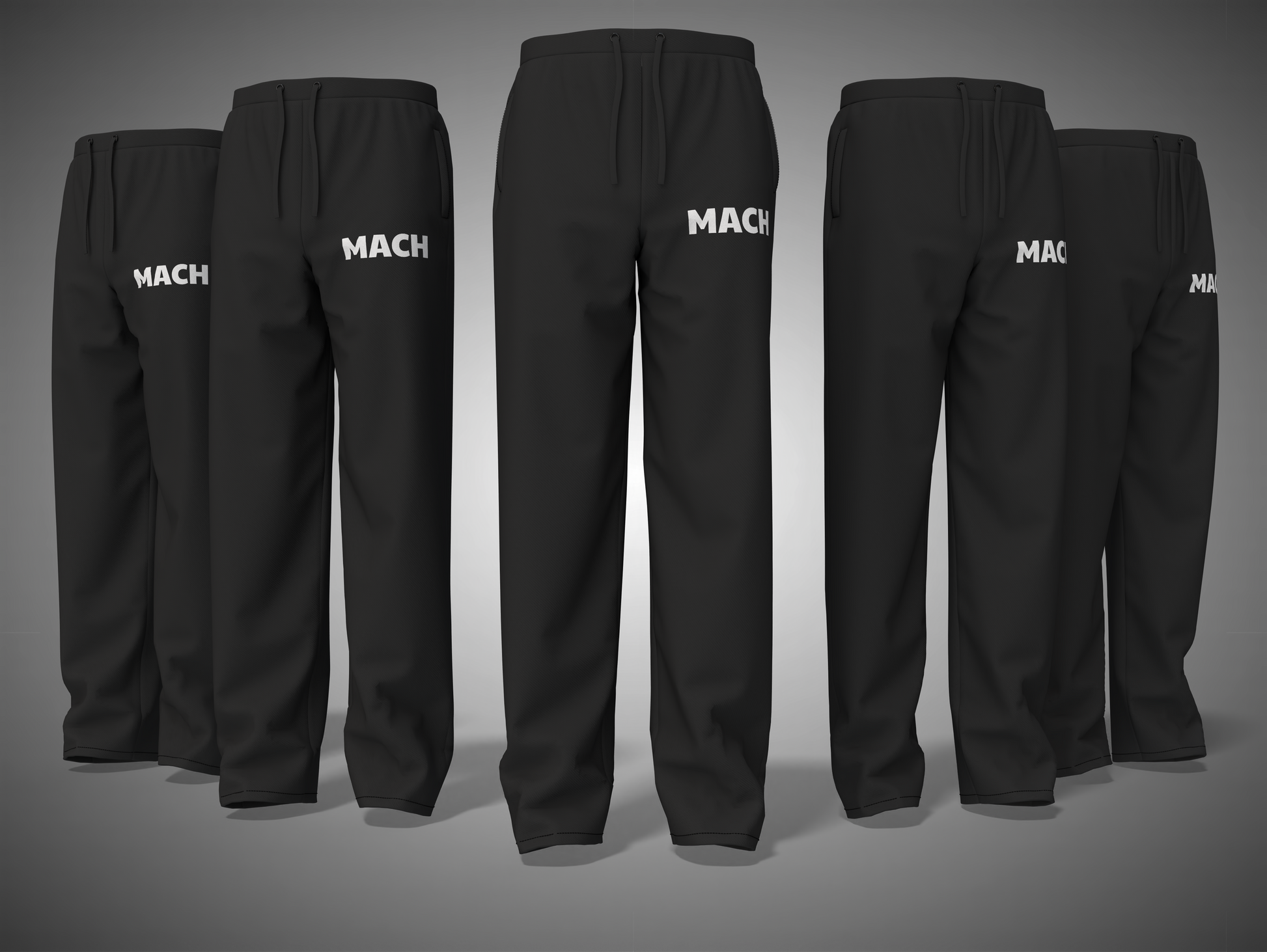 black pants with 'MACH' branding on a gray background