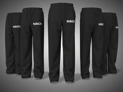 black pants with 'MACH' branding on a gray background