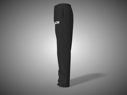 Black knee-high boot with a brand logo on a gray background