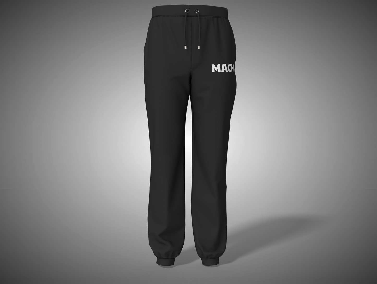 Black pants with 'MACK' branding on a gray background