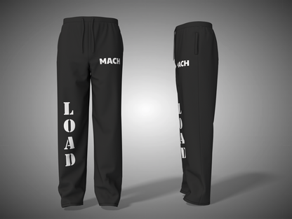 Black pants with 'MACH LOAD' text on a gray background