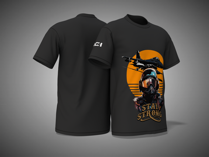 Black t-shirt with a graphic design of a person on a motorcycle and 'Stay Strong' text, displayed on a gray background.