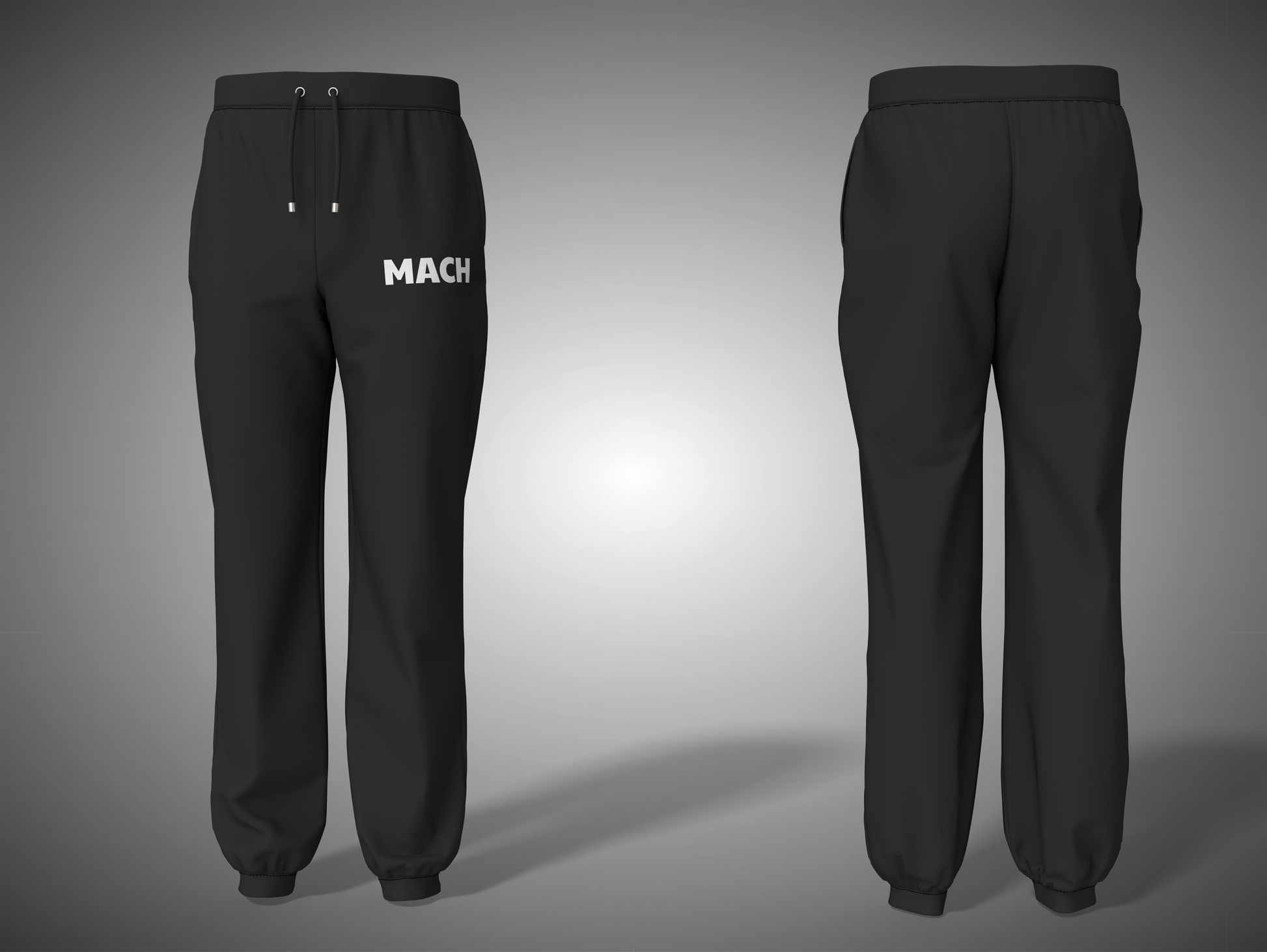 Black sweatpants with 'MACH' branding on a gray background