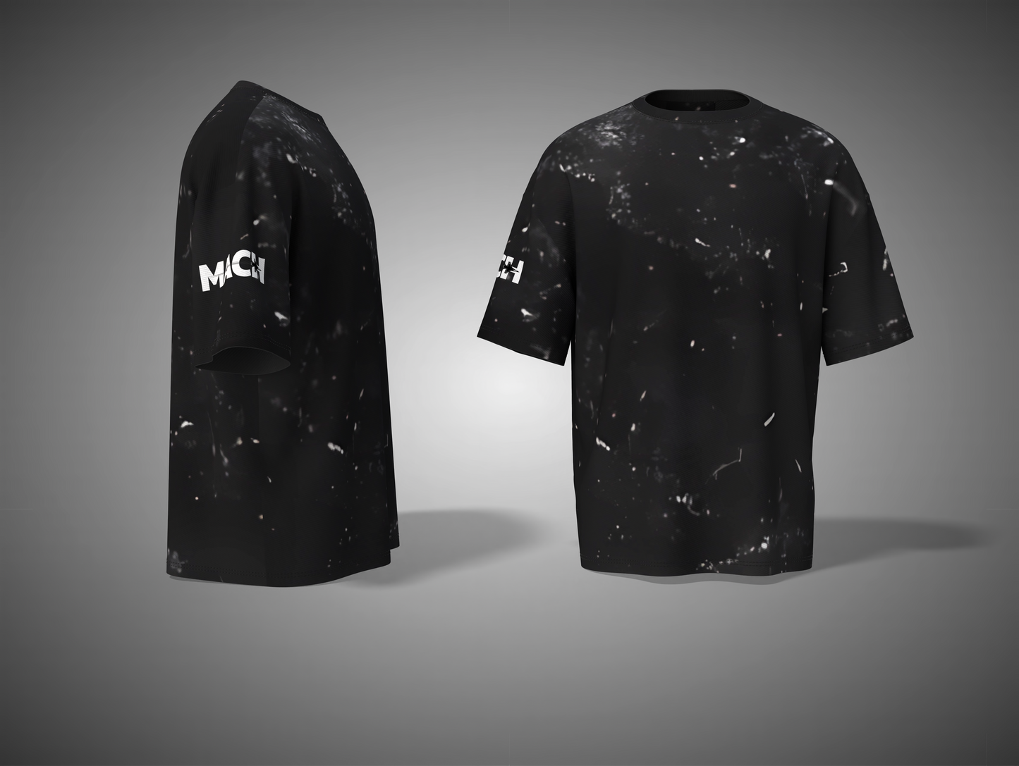 Black t-shirt with white speckles and 'MCI' branding on a gray background
