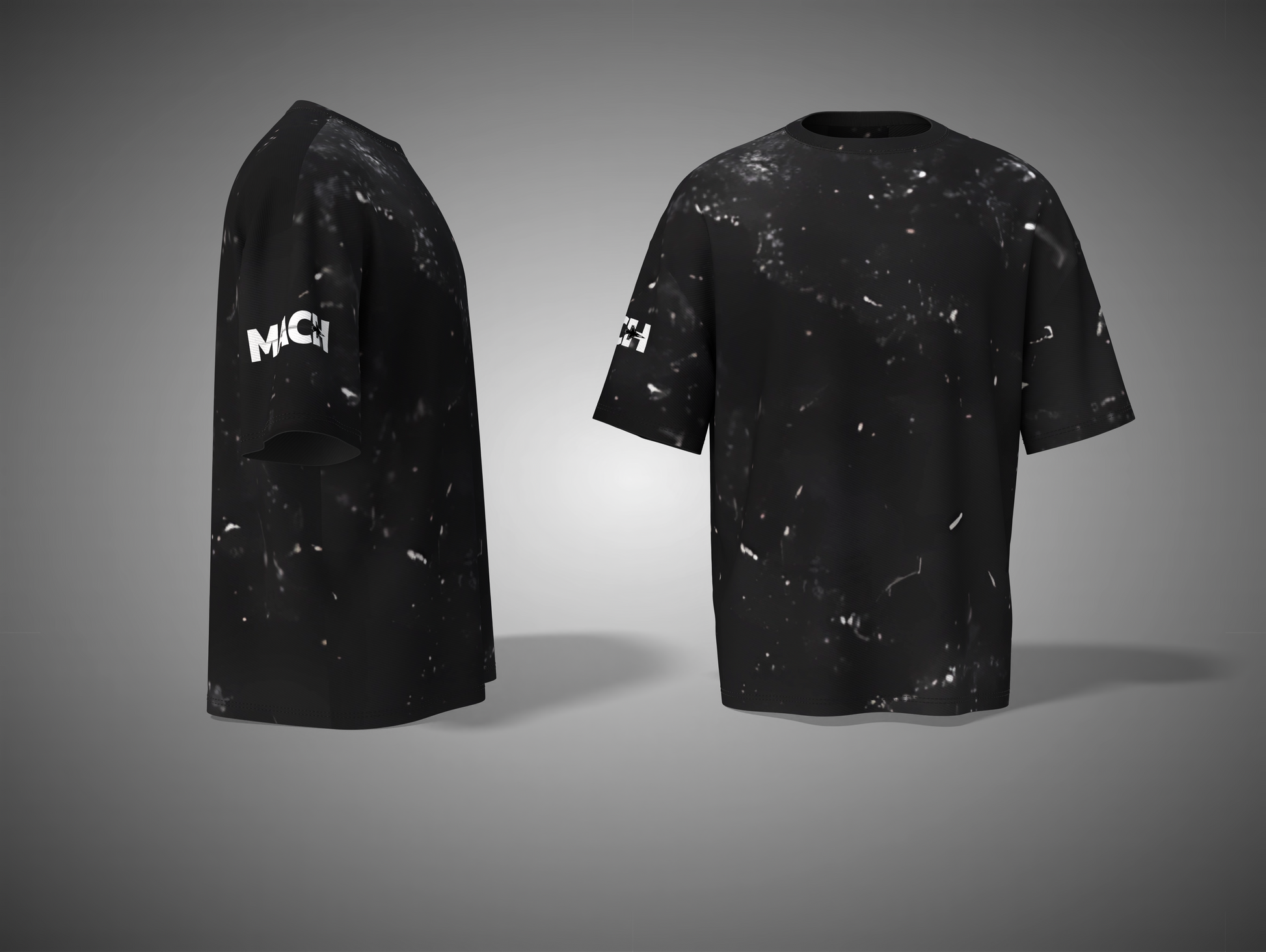 Black t-shirt with white speckles and 'MCI' branding on a gray background