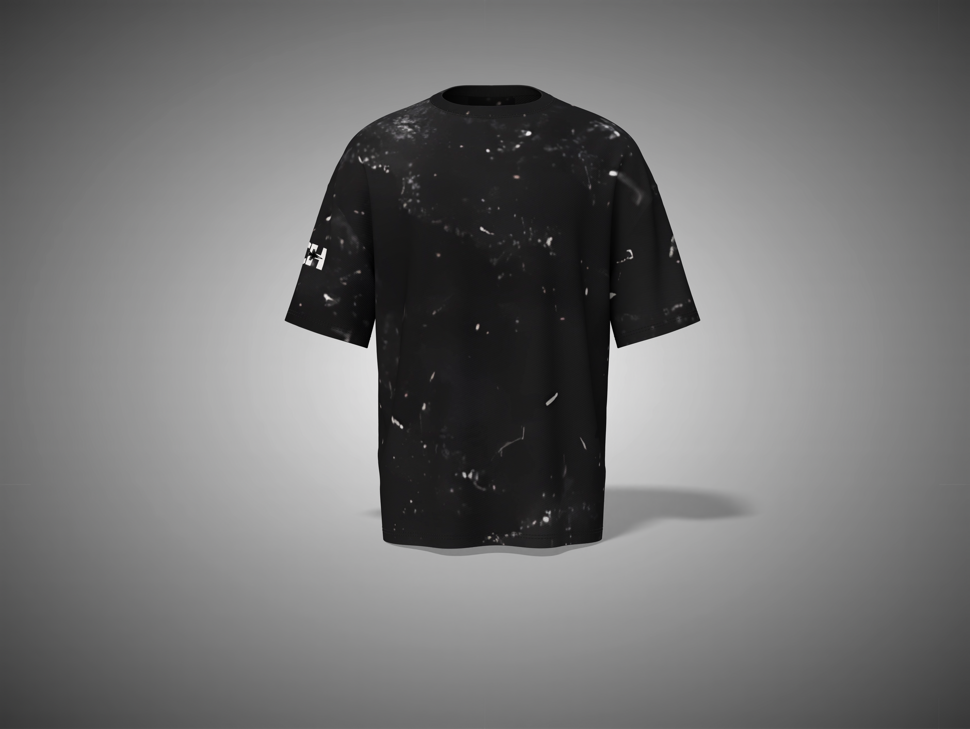 Black t-shirt with abstract patterns on a gray background
