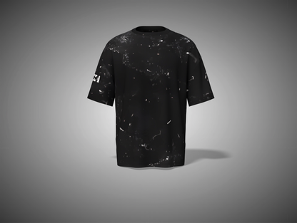 Black t-shirt with abstract patterns on a gray background