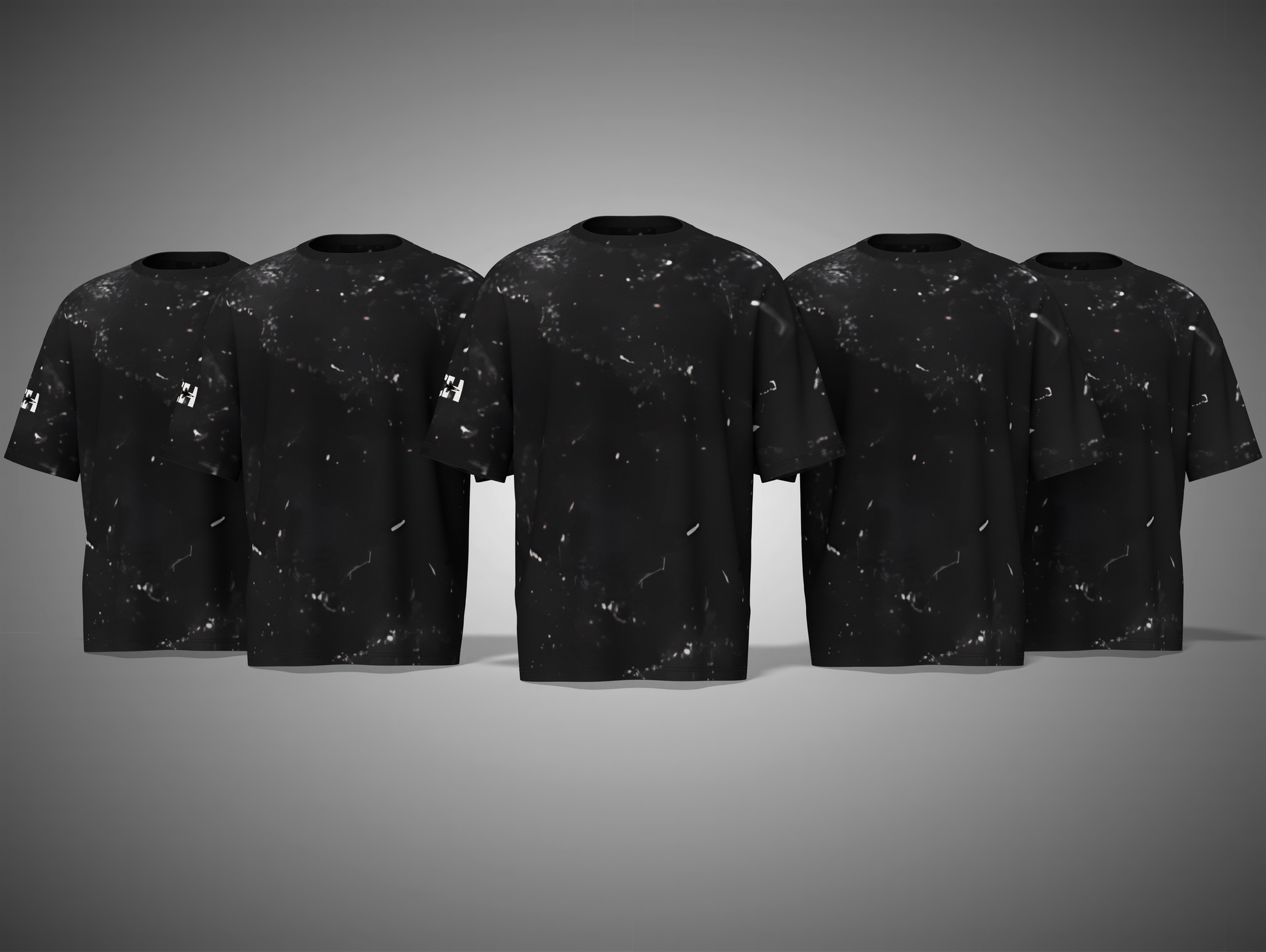 Five black t-shirts with white speckle pattern on a gray background