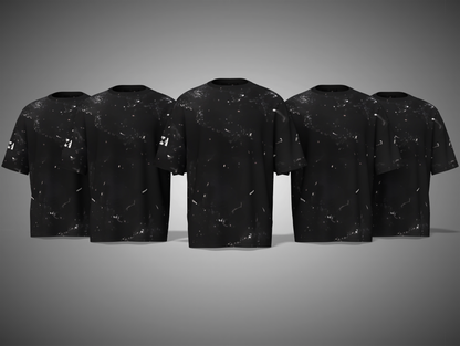 Five black t-shirts with white speckle pattern on a gray background