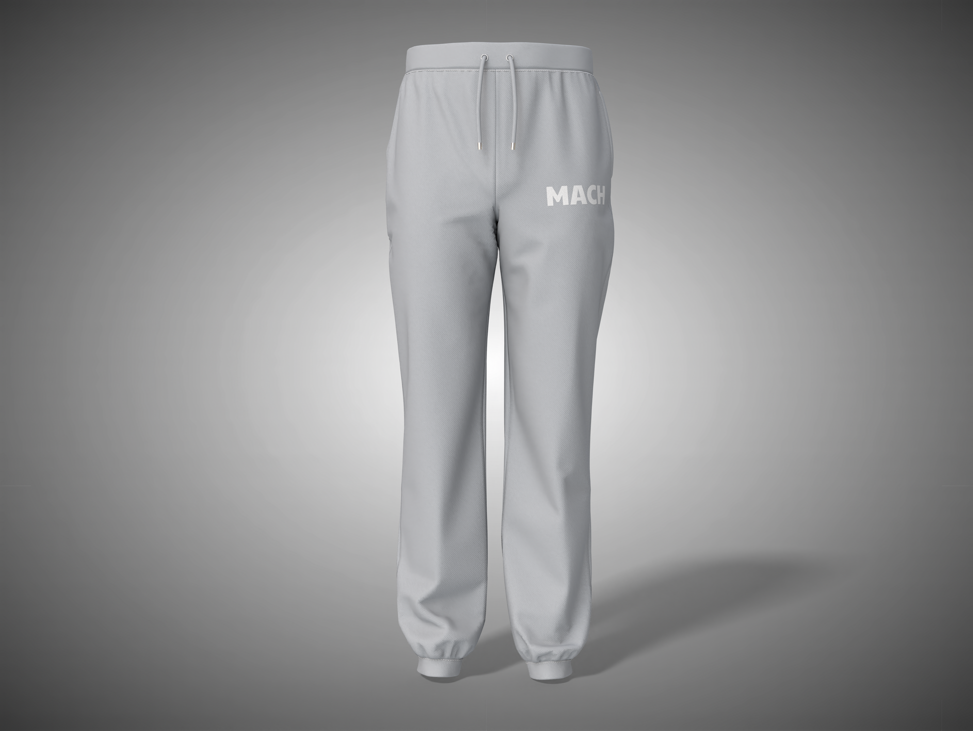 Gray sweatpants with 'MACK' branding on a gray background