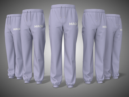 Lavender sweatpants with 'MACH' branding on a gradient gray background