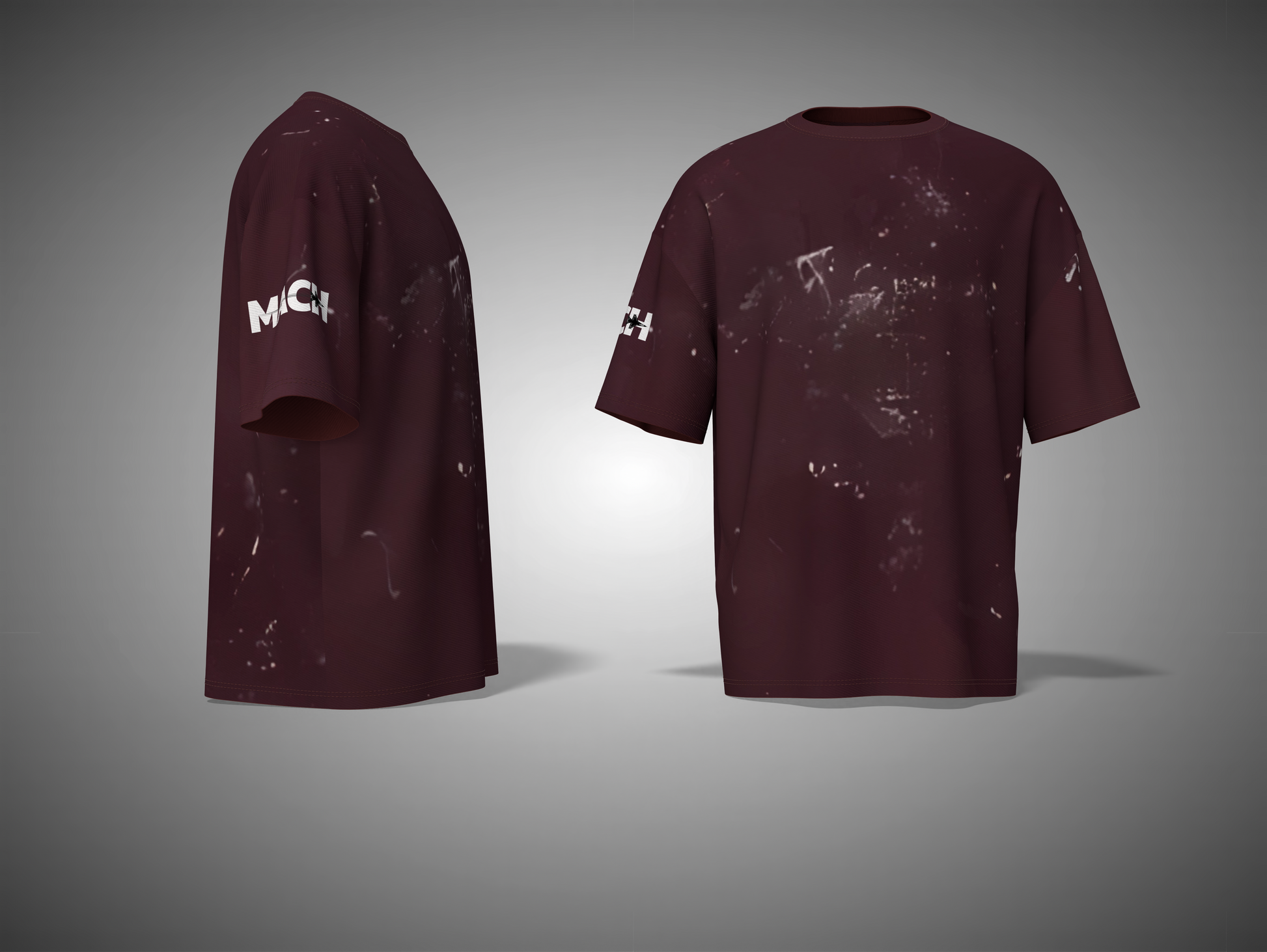 Maroon t-shirt with white splatter design on a gray background
