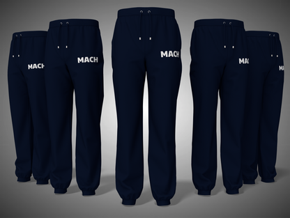 Navy blue sweatpants with 'MACH' branding on a gray background