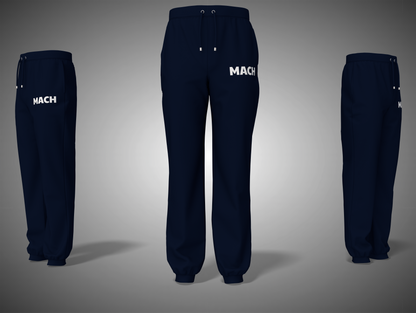 Navy blue pants with 'MACH' branding on a gray background
