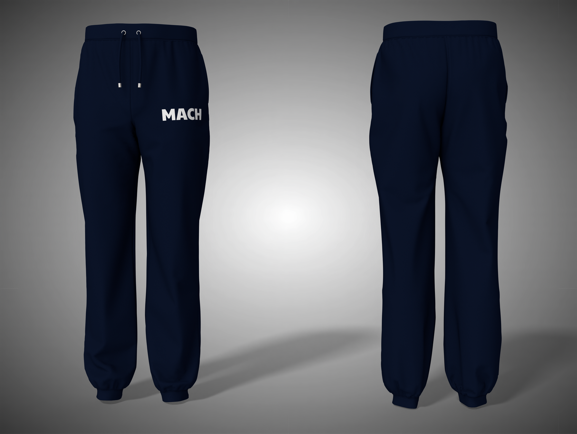 Navy blue sweatpants with 'MACH' branding on a gray background