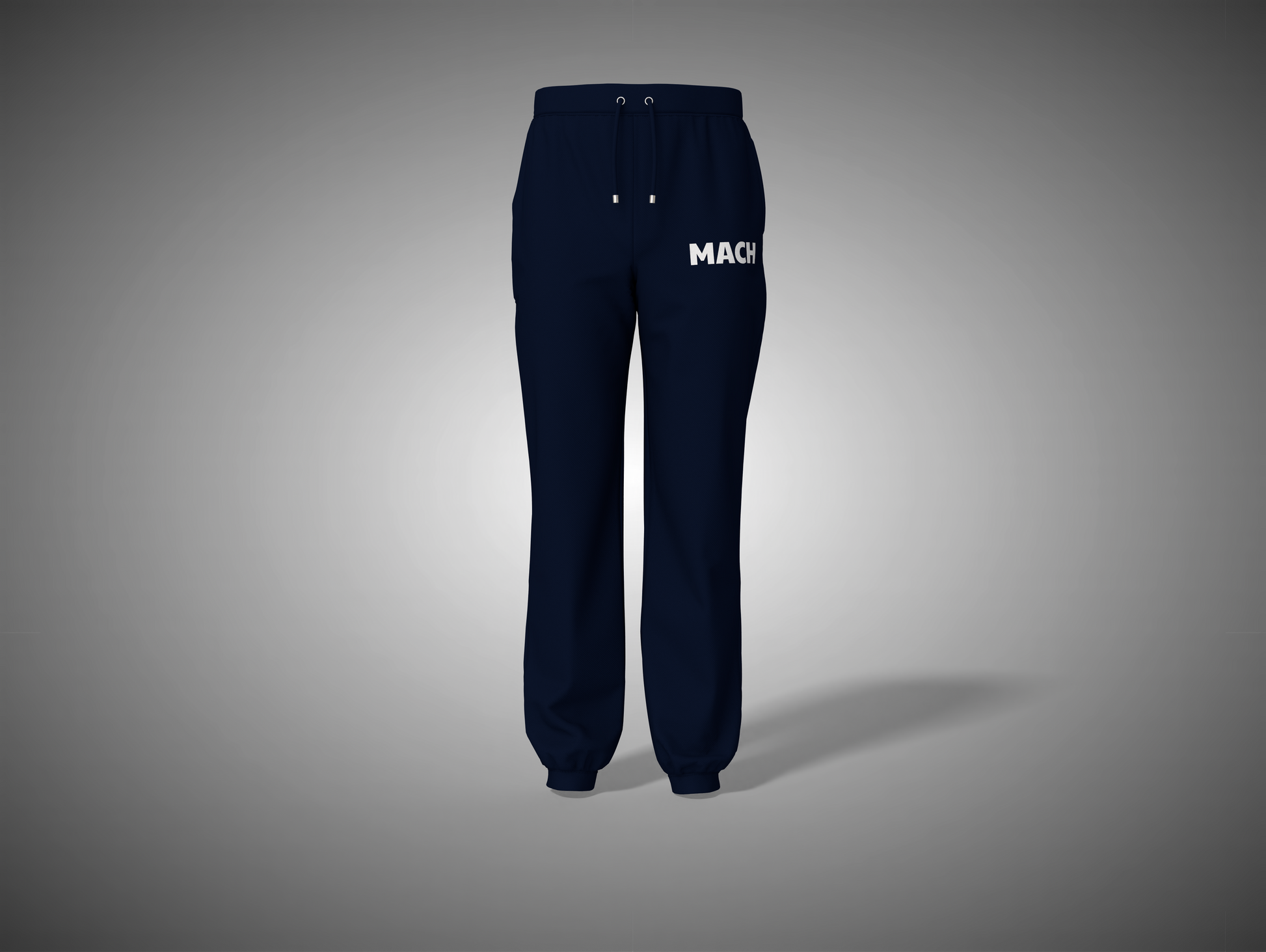 Navy blue sweatpants with 'MACK' branding on a gray background