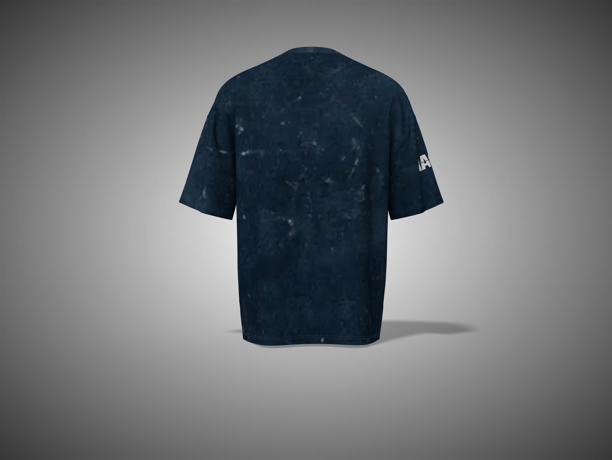 Navy Blue t-shirt with a logo on the sleeve against a gray background