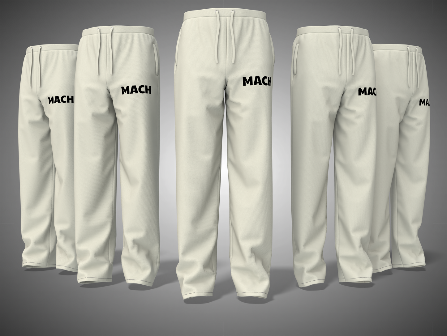 Set off white sweatpants with 'MACH' branding on a gray background