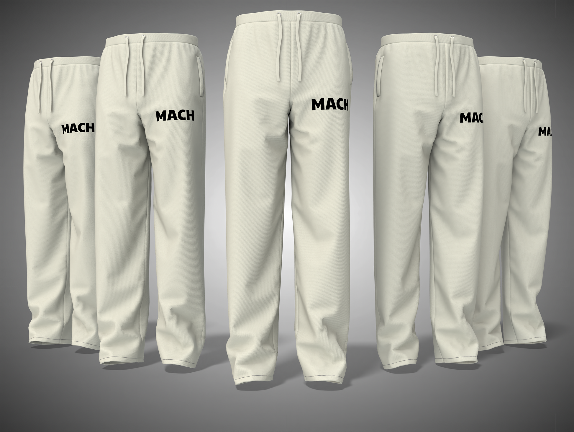 Set off white sweatpants with 'MACH' branding on a gray background