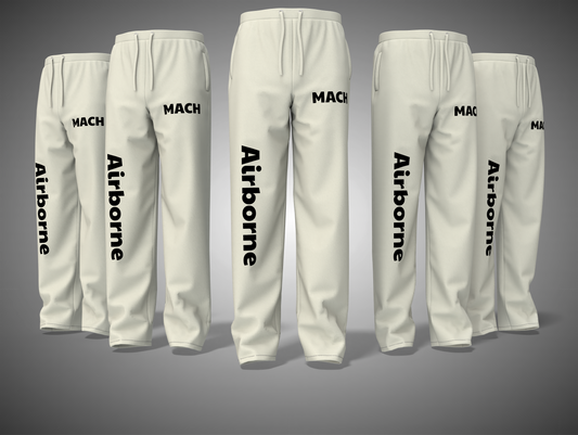 Off White pants with 'Airborne' and 'MACH' text on a gray background