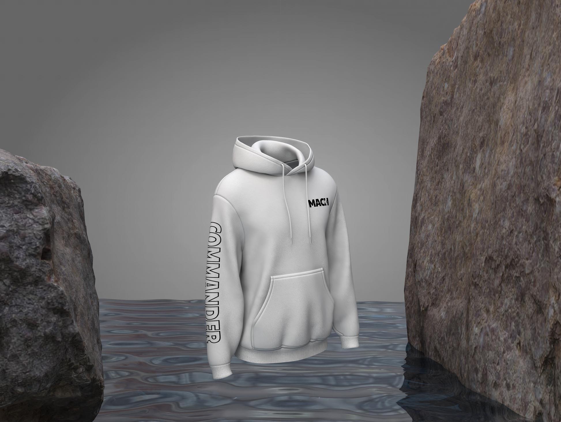 White hoodie with text on a gray background between two rocks