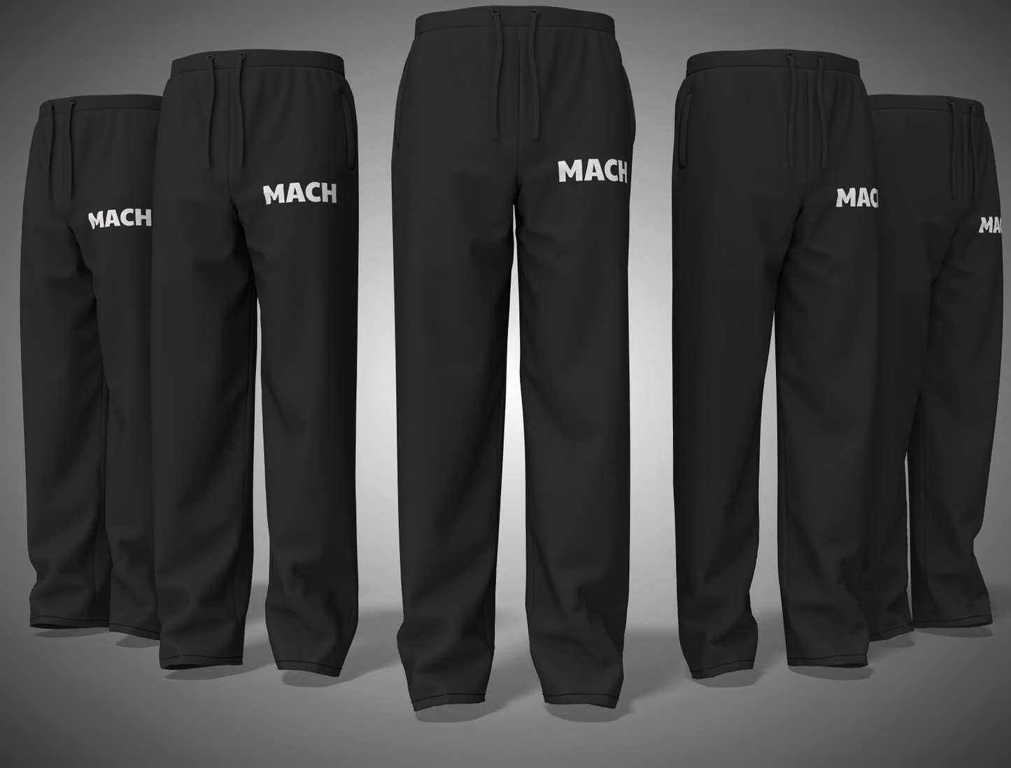 Black pants with 'MACH' branding on a gray background