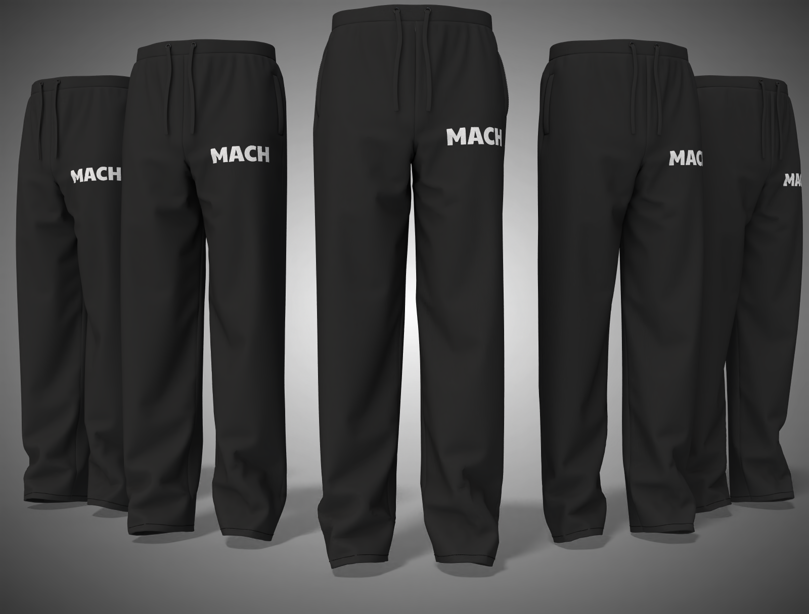 Black pants with 'MACH' branding on a gray background